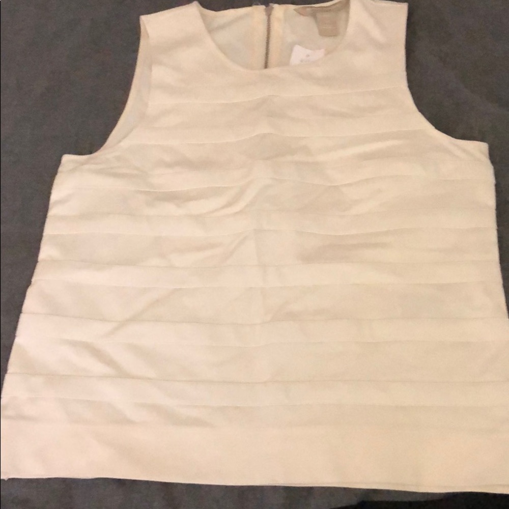 White sleeveless top